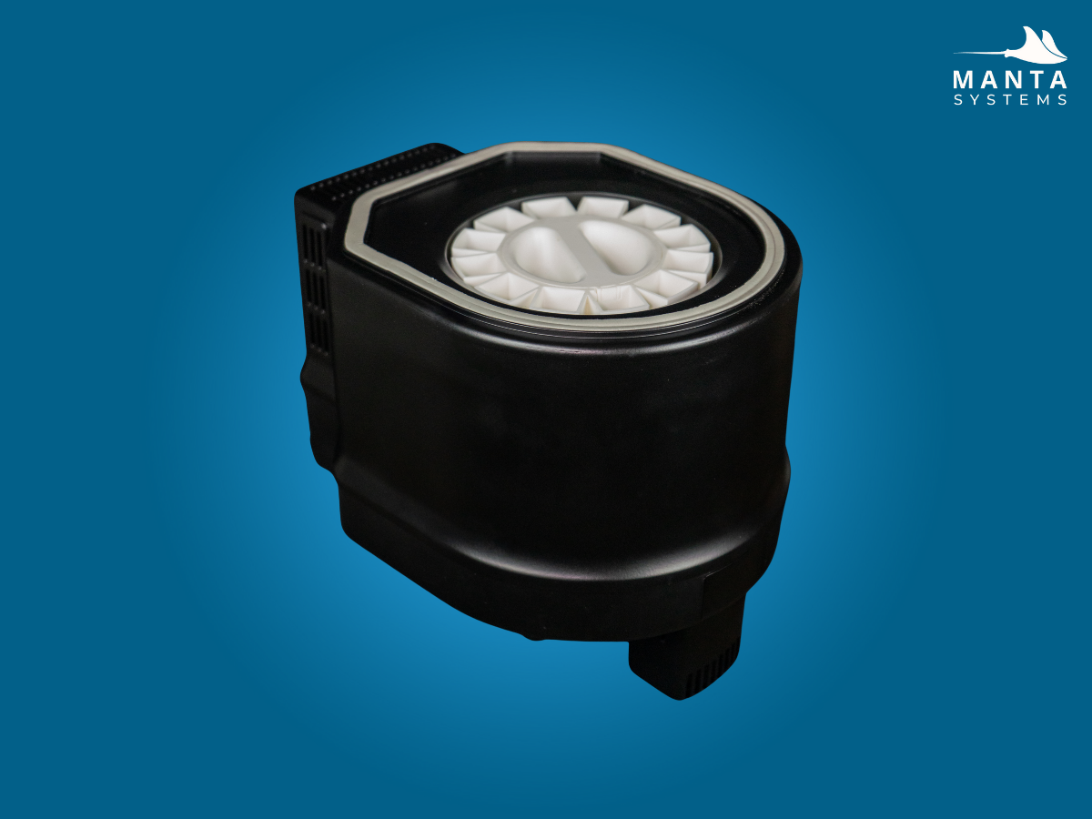 Manta Systems R1 Feeder with no lid from an overhead view showing the empty feeding carousel on a blue background.